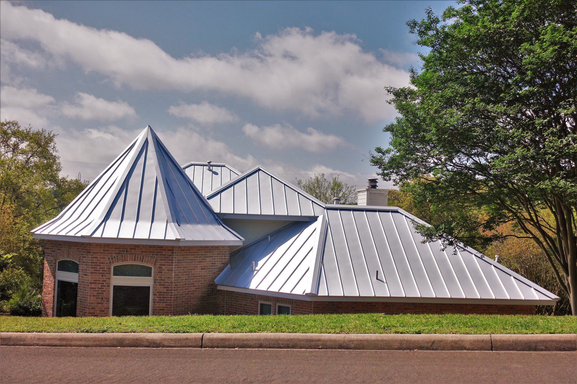 Slate roofing is one of many roofing options for your building. Read here for the pros and cons of a burnished slate metal roof to decide if it's right for you.